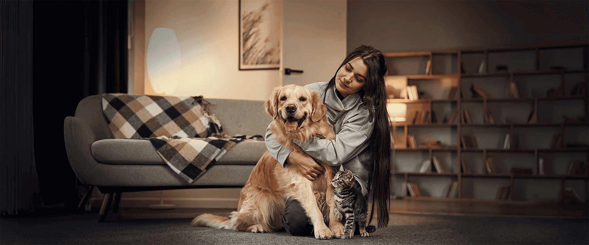 Pet Owner with her cat and dog